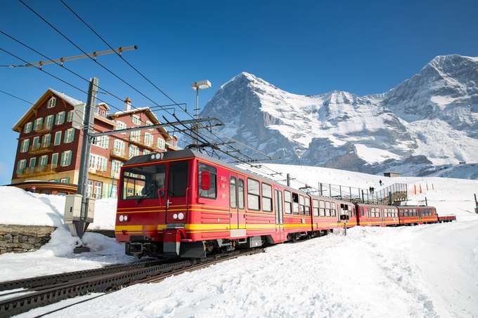 Ride the Jungfraujoch train to Europe’s highest railway station, surrounded by snow-capped Alpine peaks