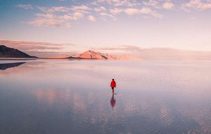 Soak-in the beauty of the Bonneville Salt Flats, here endless horizons create mirror-like reflections