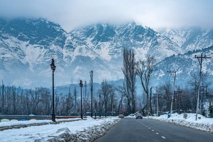 Explore the charm of Srinagar with its lakes, gardens, and vibrant bazaars