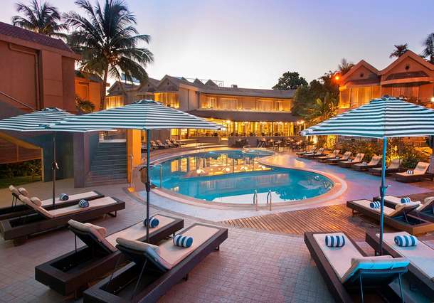 Whispering Palms Beach Resort with pool and surrounding accommodations