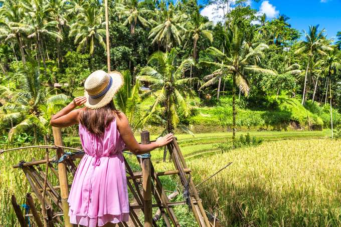 Wander through the lush green Tegalalang Rice Terrace