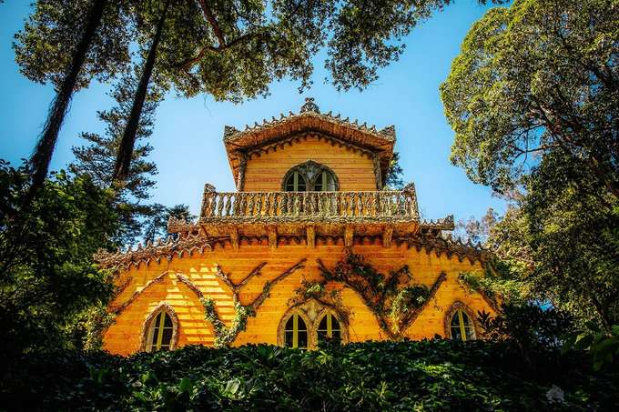 Explore the Pena Park in Sintra and visit the Chalet of the Countess of Edla
