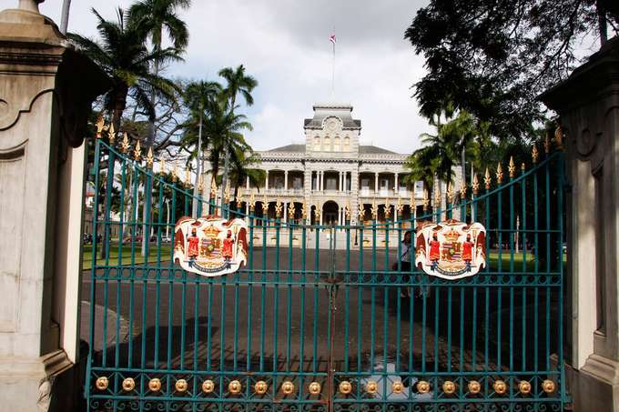 Visit Iolani Palace, a symbol of Hawaii’s royal heritage and historic grandeur