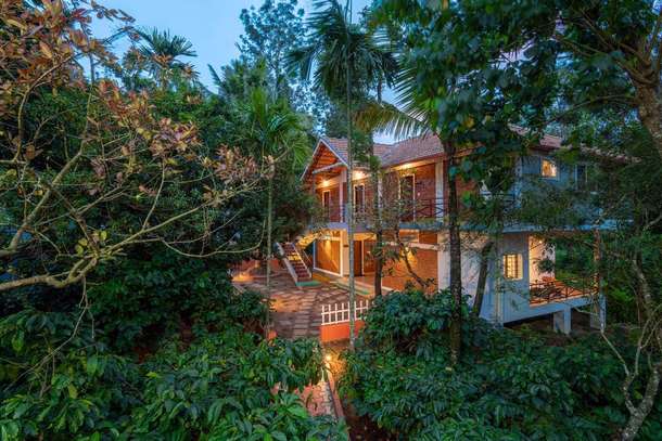 Outside View of Homestay surrounded by lush greenery