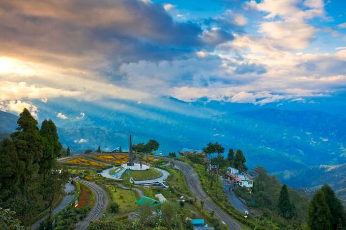 Admire the iconic Batasia Loop, a scenic highlight of your 8-hour Darjeeling tour