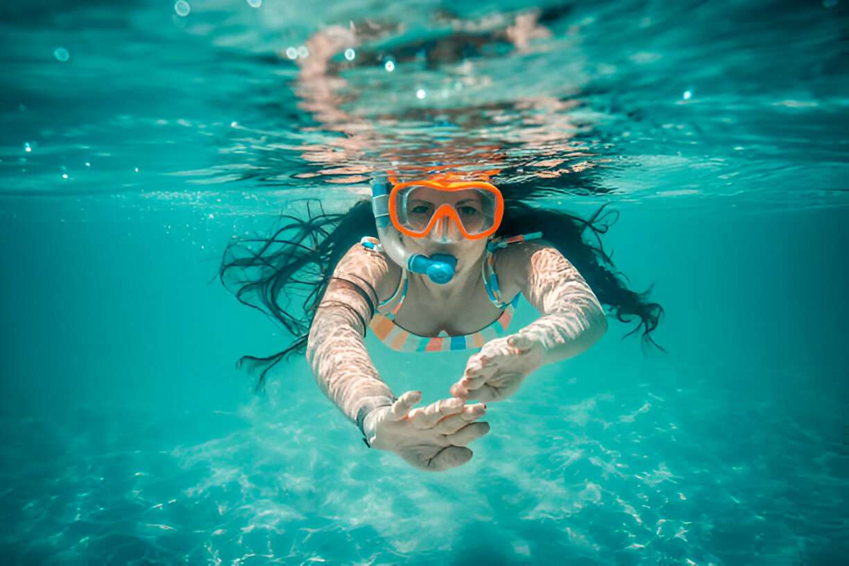 Explore the vibrant underwater world with snorkeling