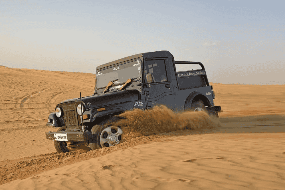Embark on  a 4-hour thrilling dune bashing session in Bikaner