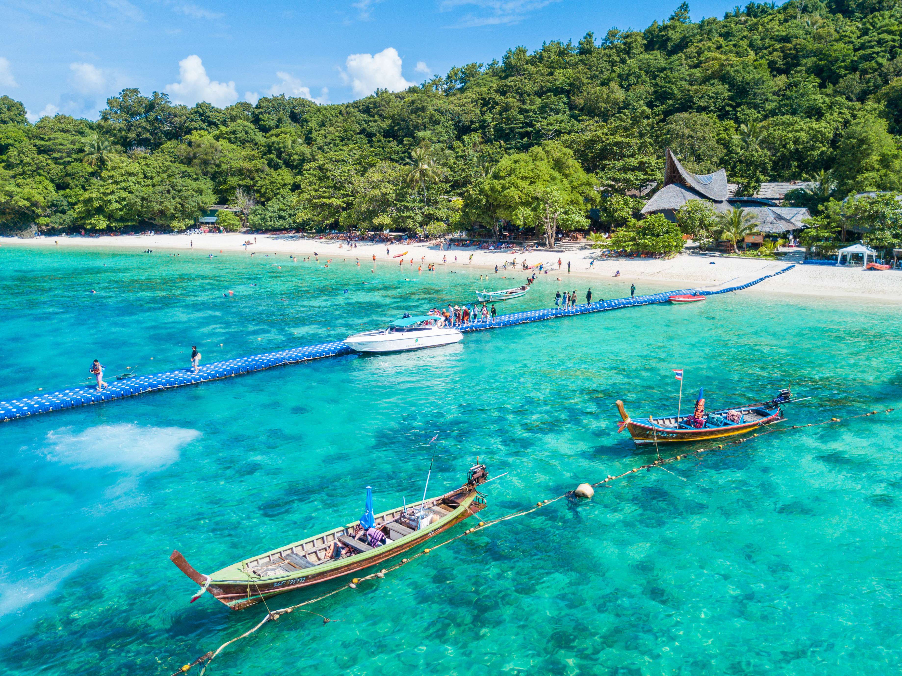 Boats at the beautiful Coral Island, Thailand