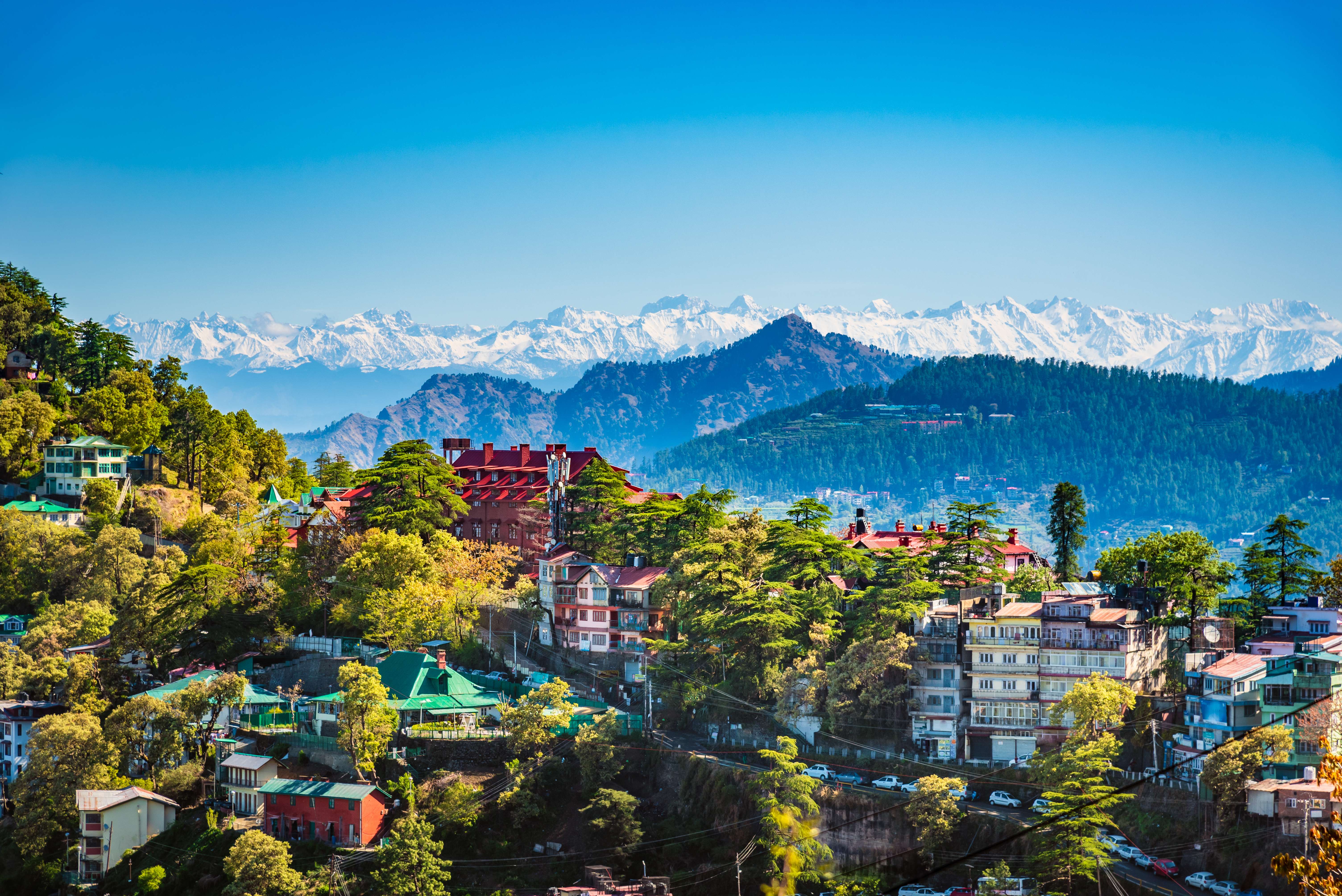 Get mesmerized by the panoramic views of Shimla nestled amongst the Himalayas mountains 