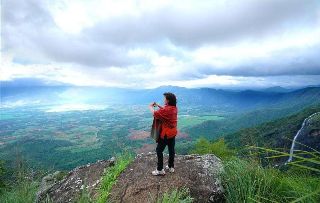 Gaze out at sprawling spice plantations and forested peaks