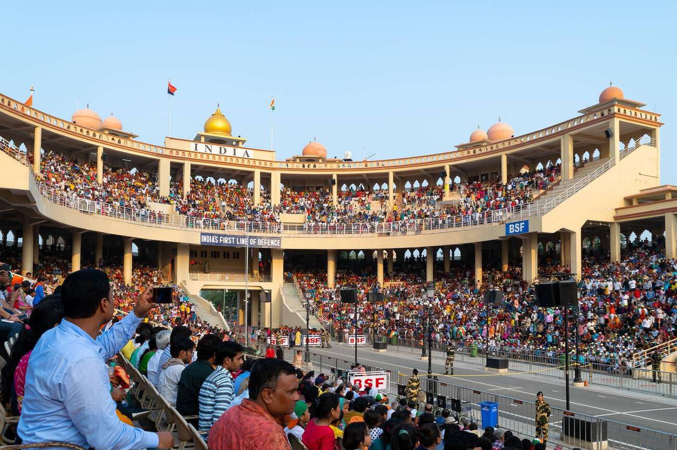 Witness the electrifying energy of the daily flag-lowering ceremony at the Attari-Wagah Border
