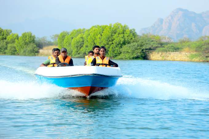 Cruise past lush mangroves and gentle waves