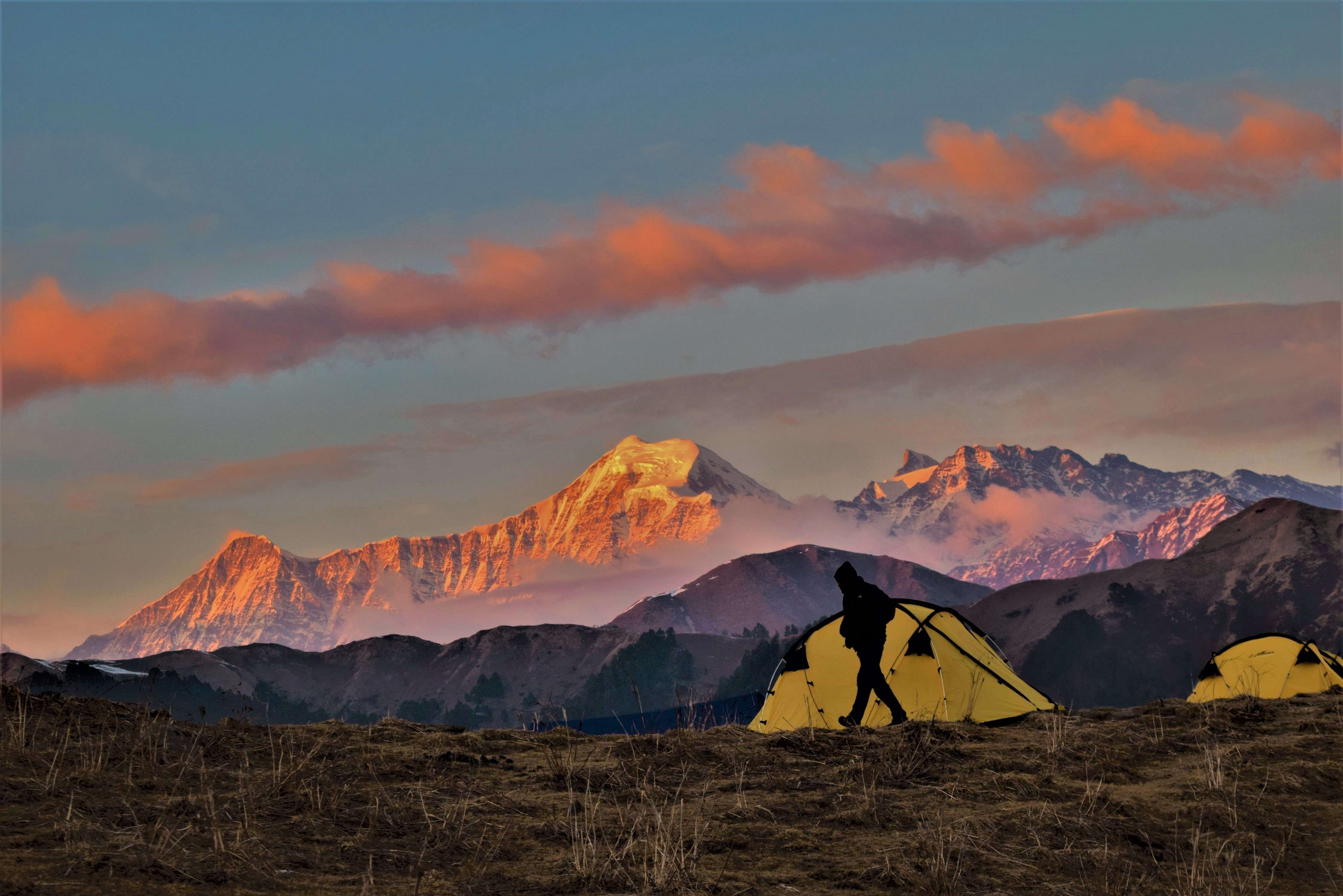 Camp at Gui & witness a sunset that paints the entire place in the brightest shade of red and orange