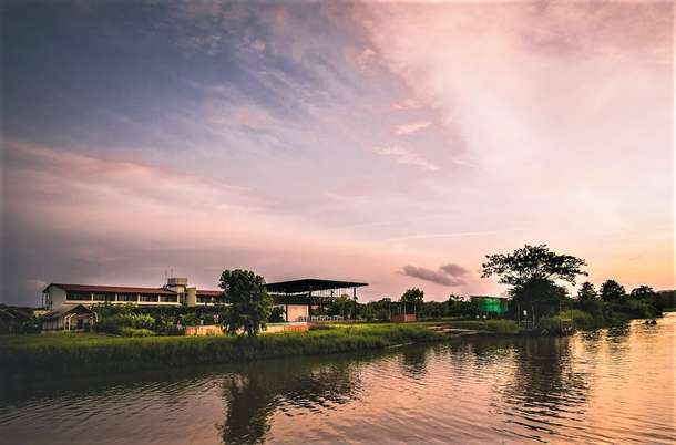 Exterior view of the resort from across the Kali River