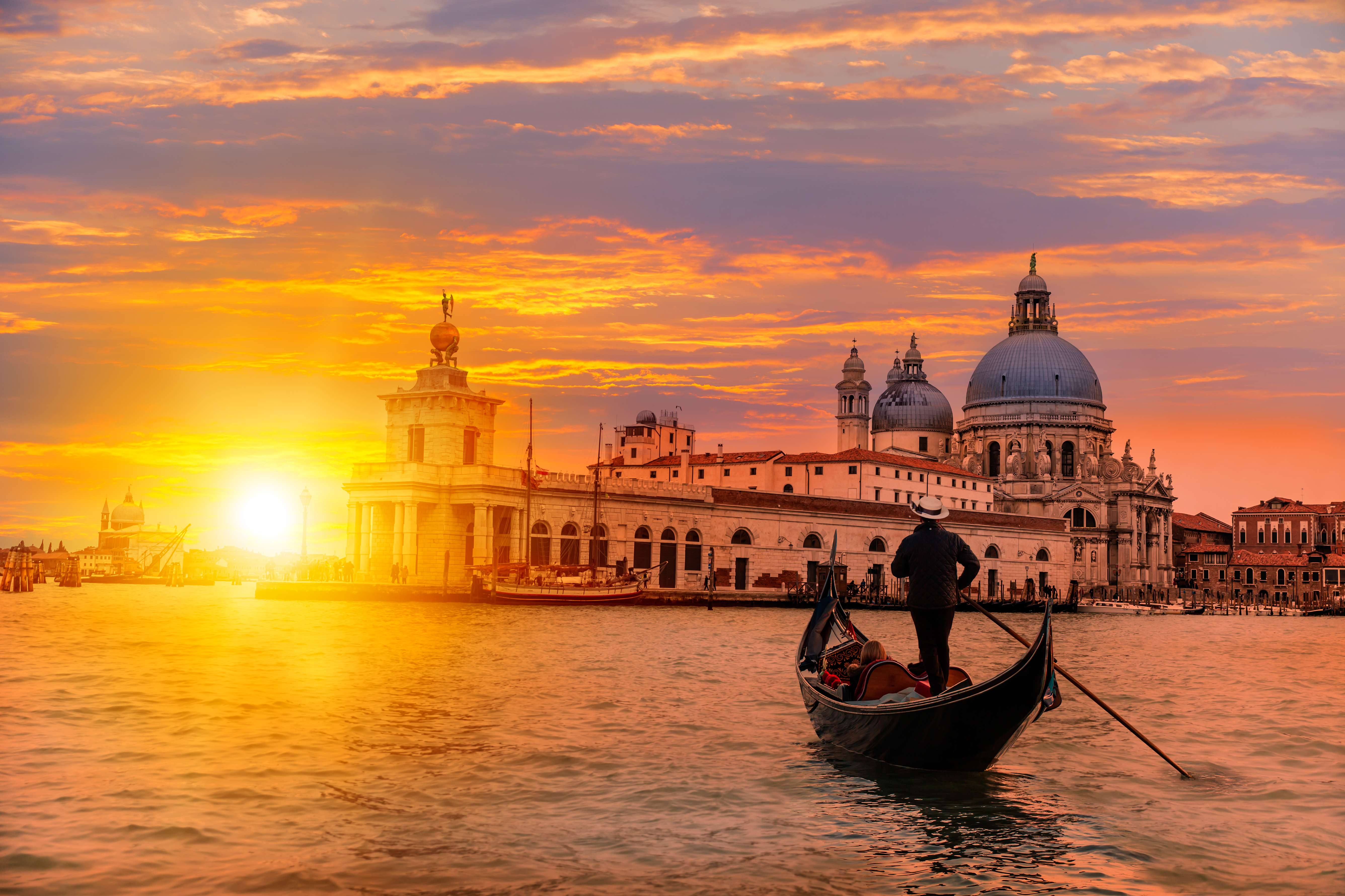 Beautiful sunset on a gondola-style boat