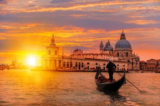Beautiful sunset on a gondola-style boat