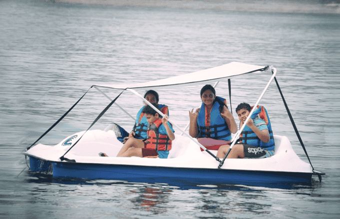 Experience peace and thrill as you explore Kanva Reservoir on a paddleboat