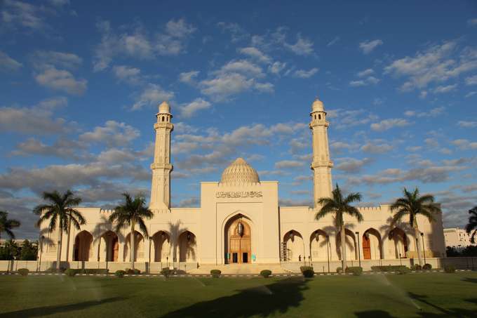 Marvel at the stunning Islamic architecture of  Sultan Qaboos Grand Mosque
