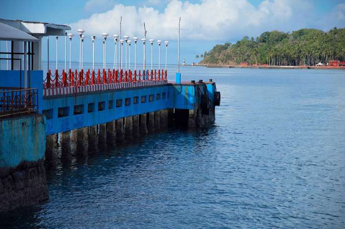 Arrive at the jetty with transfer services from your hotel and Port Blair