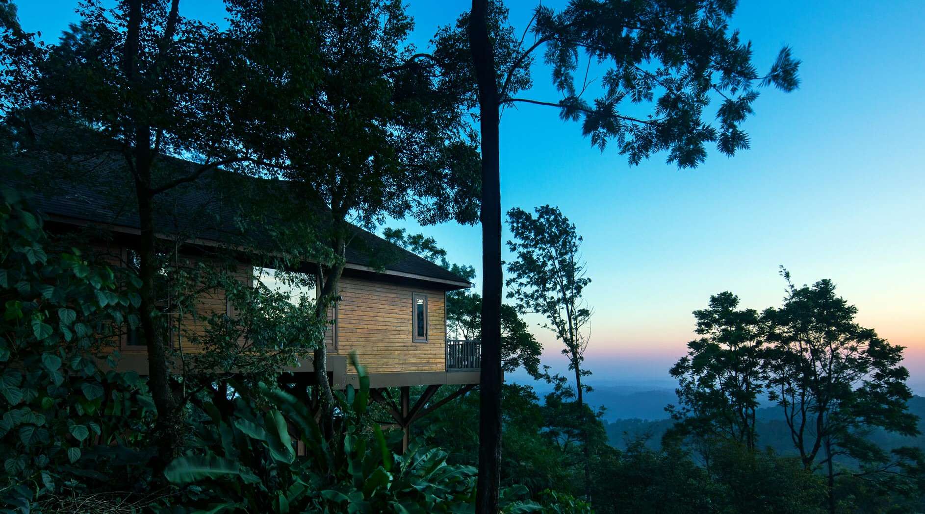 Stay in cottages overlooking the green valleys of Western Ghats