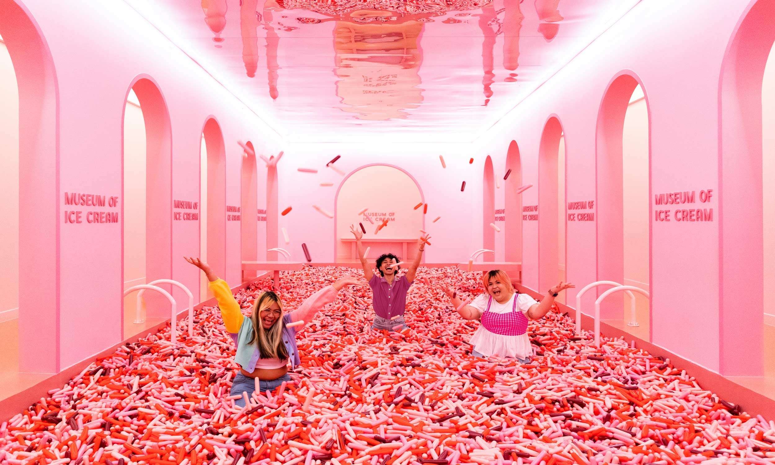 Visitors playing in the sprinkle pool