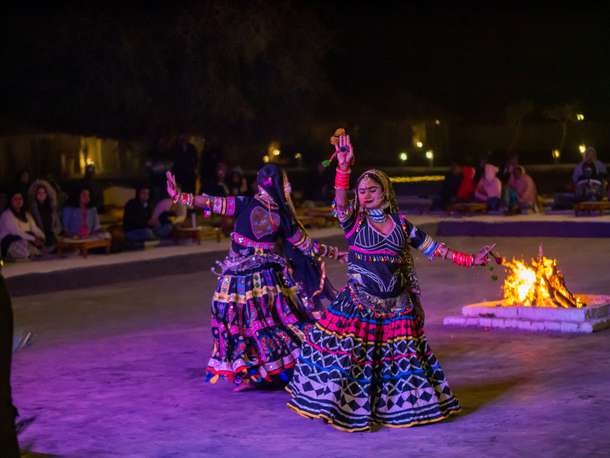 Folk dance performance in the desert