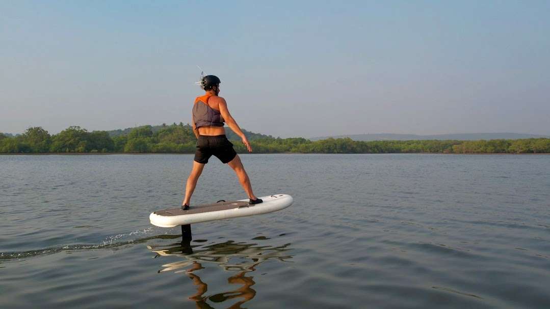 Glide above Arambol’s serene waters with e-foil surfing
