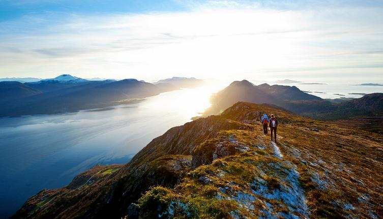 Step into nature's masterpiece as the first rays of sunlight illuminate the picturesque landscapes