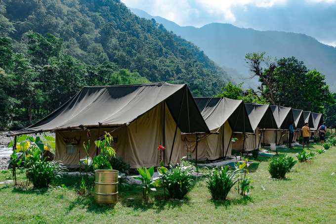 Stay in hilltop Swiss tents with breathtaking Himalayan vistas all around
