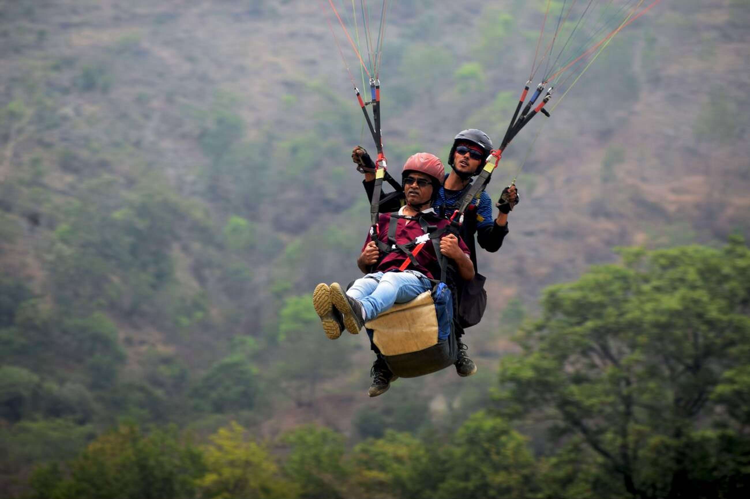 Fly above Rishikesh’s stunning green valleys