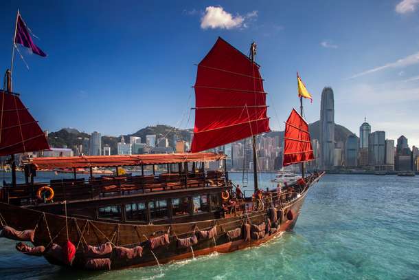 Enjoy a complimentary drink in Aqua Luna Cruise, Hong Kong