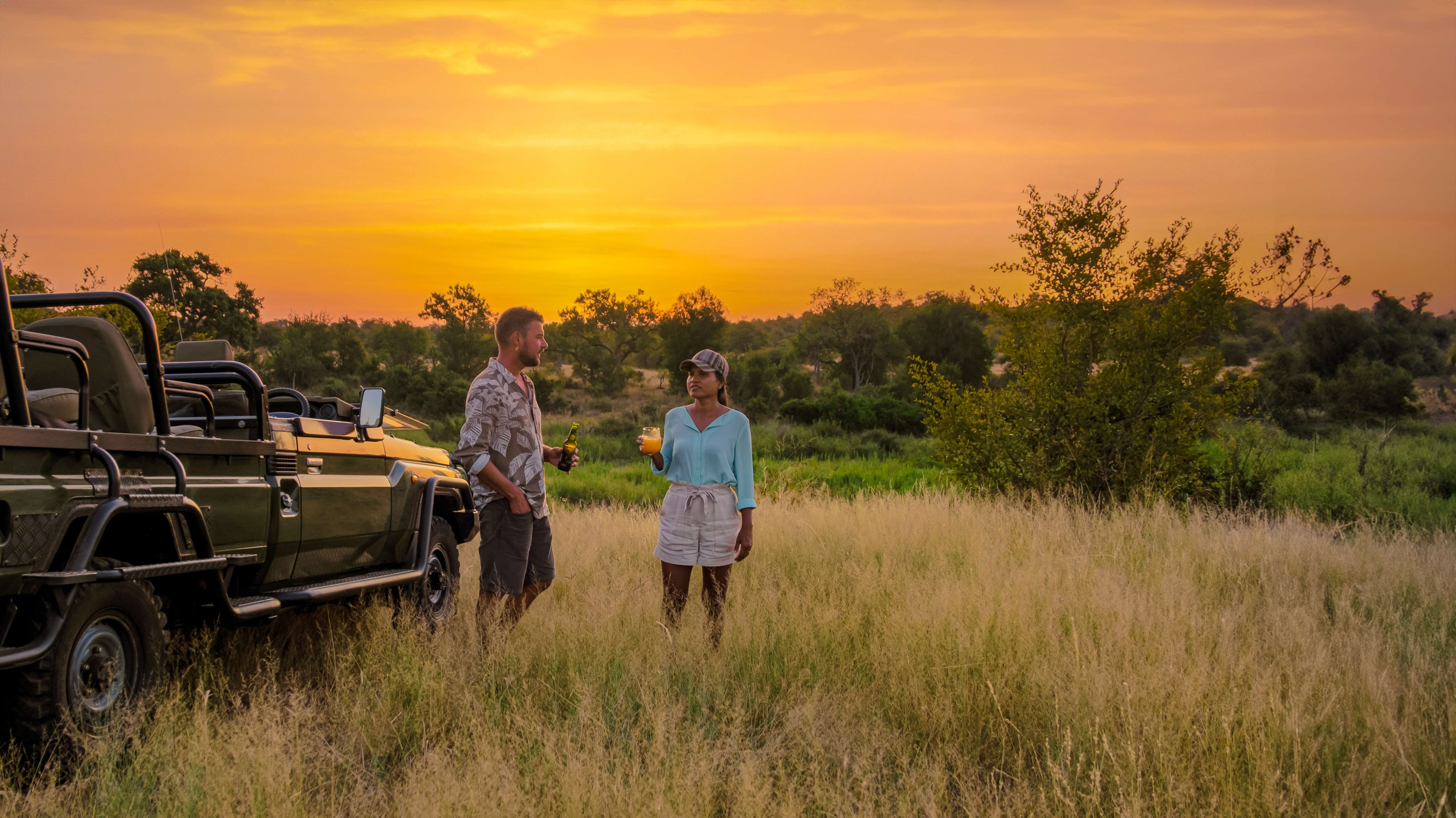 Couples enjoying sunset view of Kruger National Park, South Africa