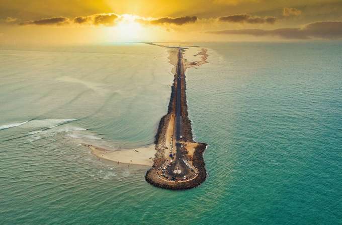 Explore Rameswaram’s beaches, and Dhanushkodi’s ruins "Explore Rameswaram’s temples, beaches, and Dhanushkodi’s ruins in a memorable 12-hour tour