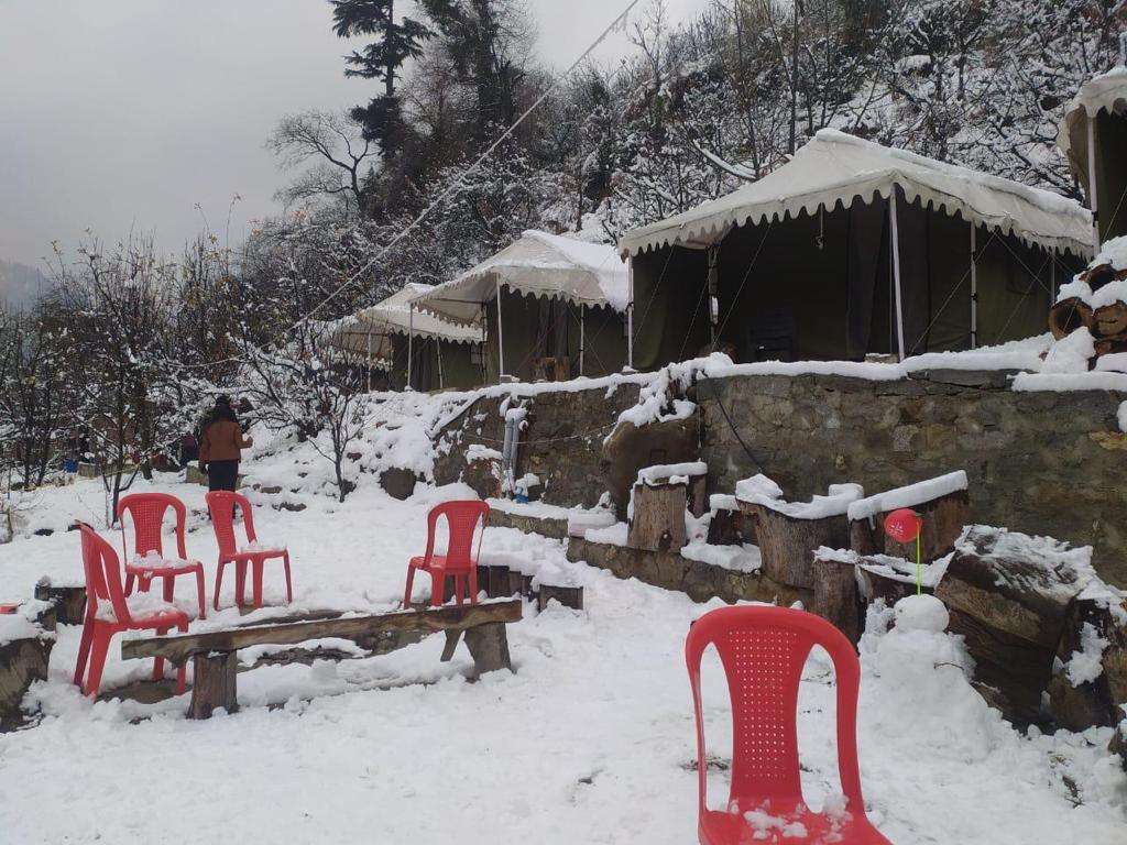 Riverside Camping Rafting and Paragliding Image