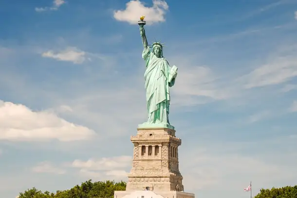 See the Statue of Liberty from the Liberty Island
