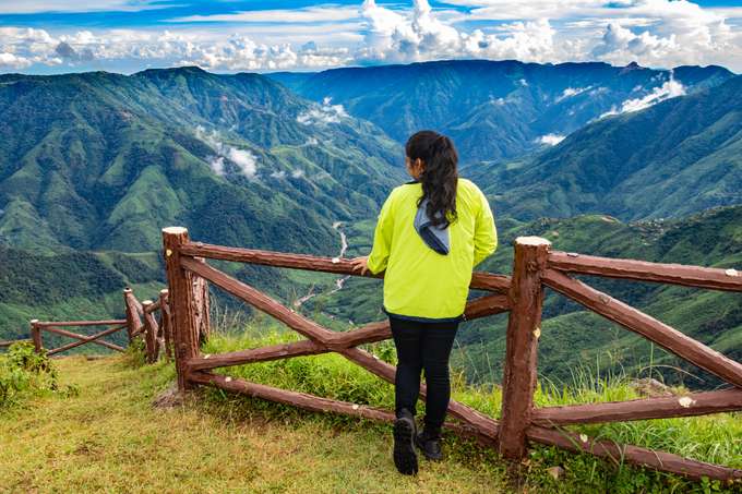 Marvel at the panoramic views of green hills from Laitlum Canyon