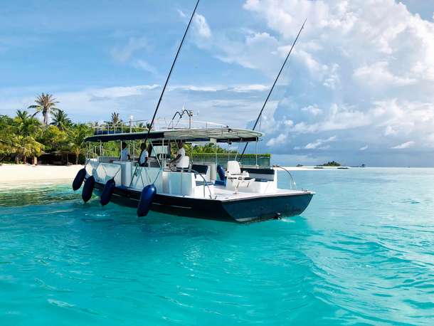 Take a speedboat ride to experience the lifestyle and culture of Huraa Island