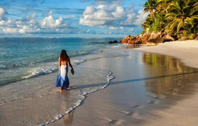 Walk on the white sands of Matamanoa Island, surrounded by crystal-clear turquoise waters