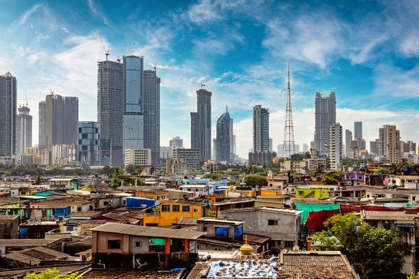 Marvel at Dharavi’s contrast of slums against Mumbai’s skyscrapers