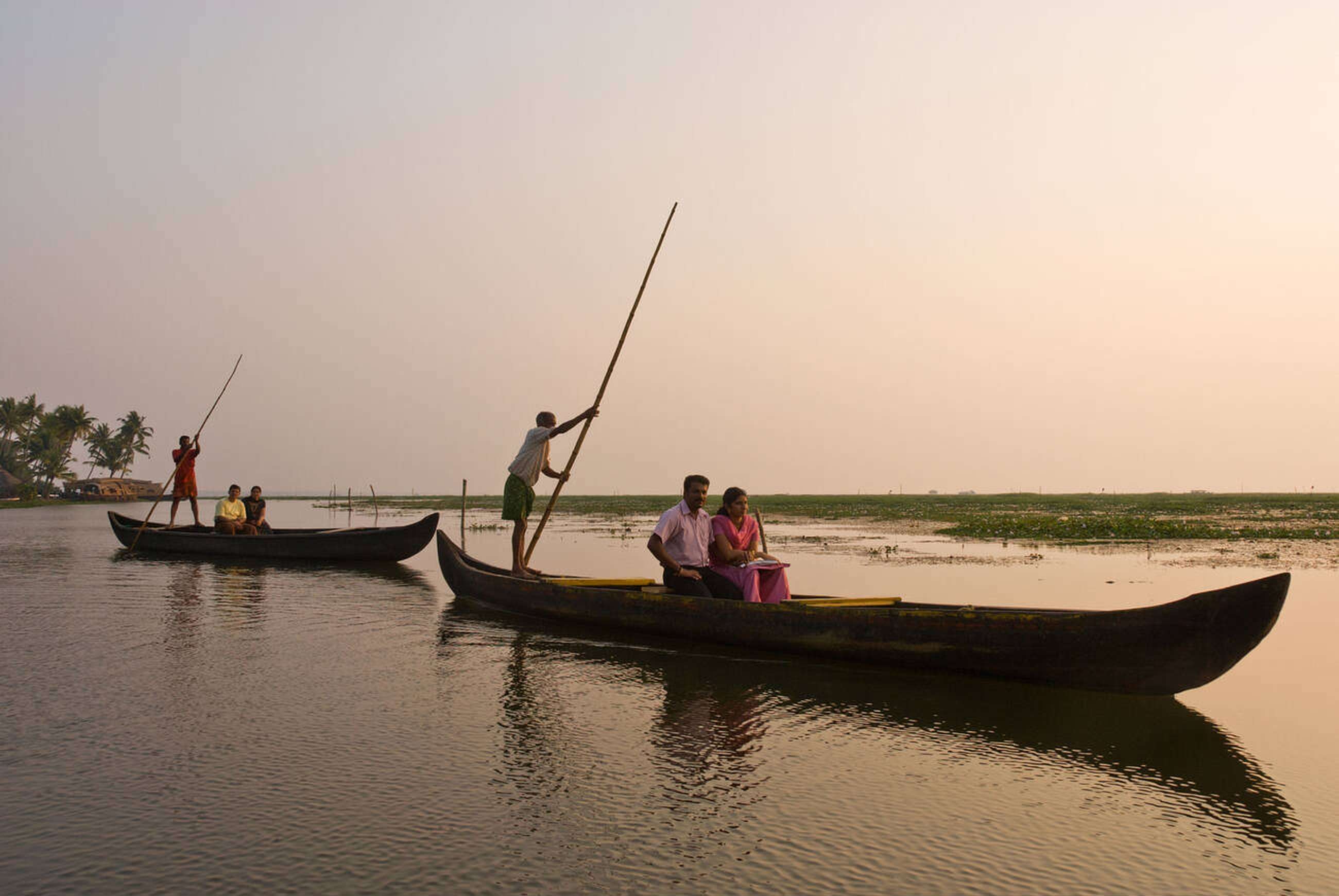 Experience the charm of nightfall on a scenic three-hour backwater ride with dinner