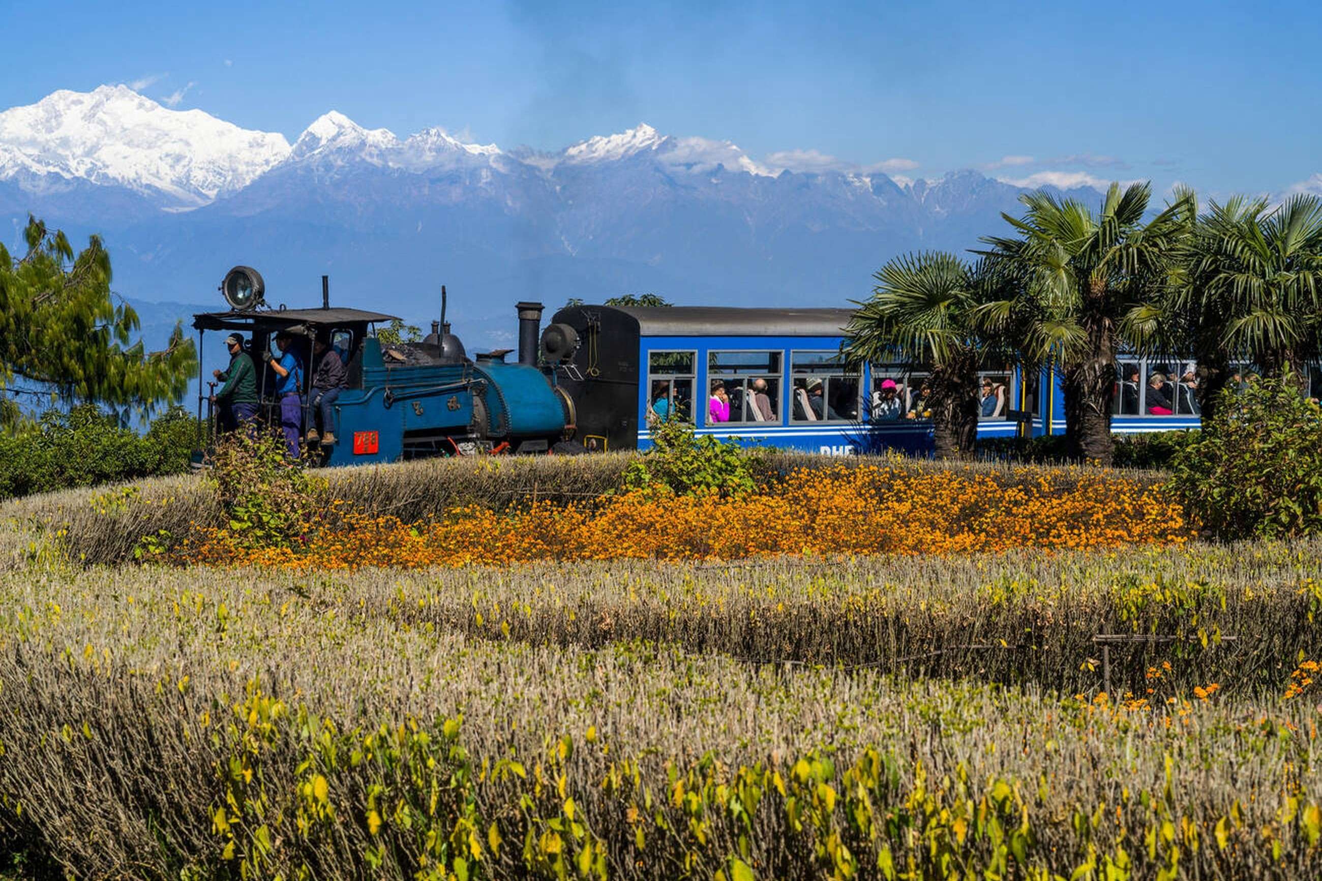 Travel from Darjeeling to Ghum in the Darjeeling Toy Train and admire the views of Kanchenjunga