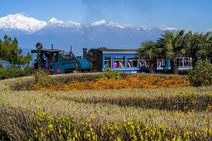 Travel from Darjeeling to Ghum in the Darjeeling Toy Train and admire the views of Kanchenjunga