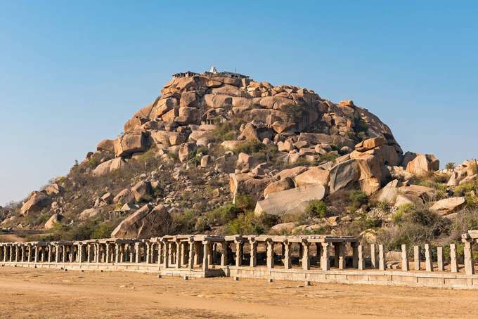 Embark on a 5.5-hour Hampi trek with village tour