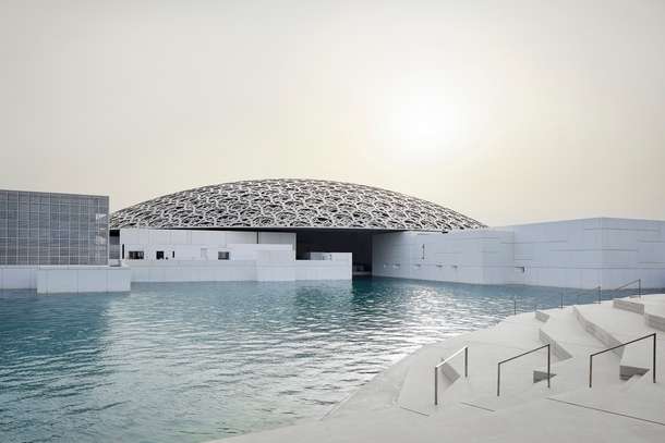 See the pool at Louvre Museum, an oasis showing mixture of art with relaxation