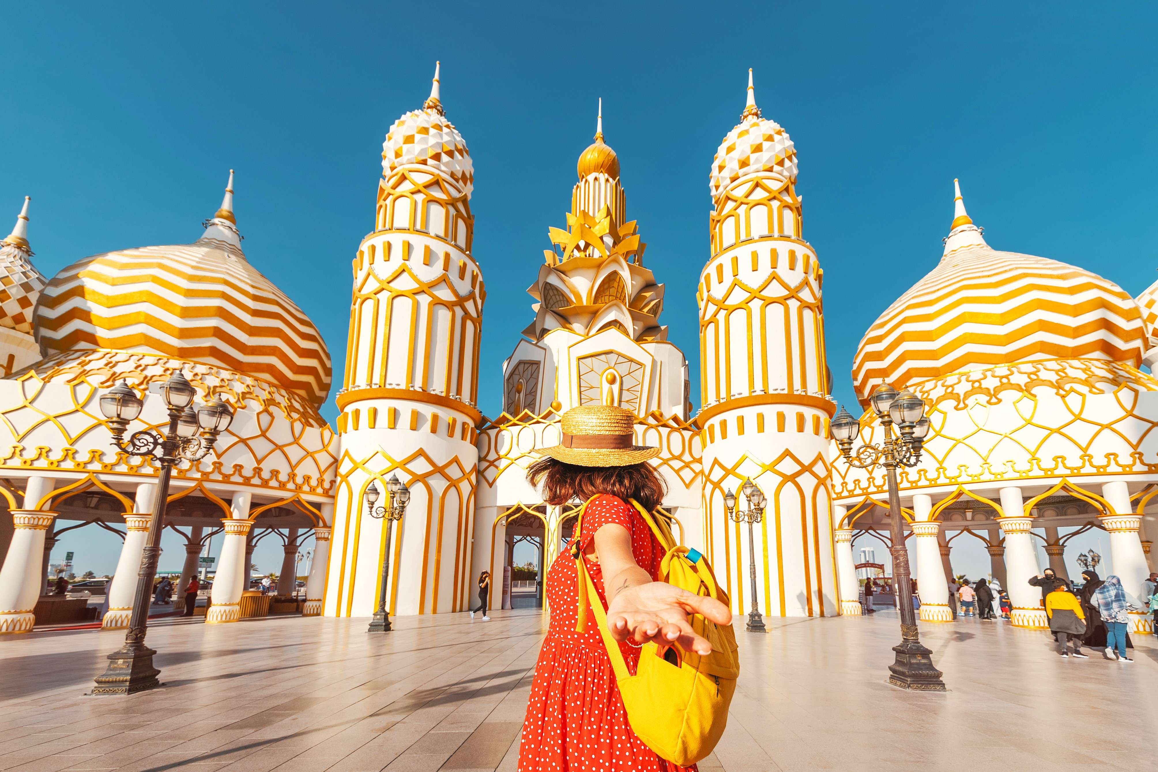 Girl at the entrance gate of the Global Village