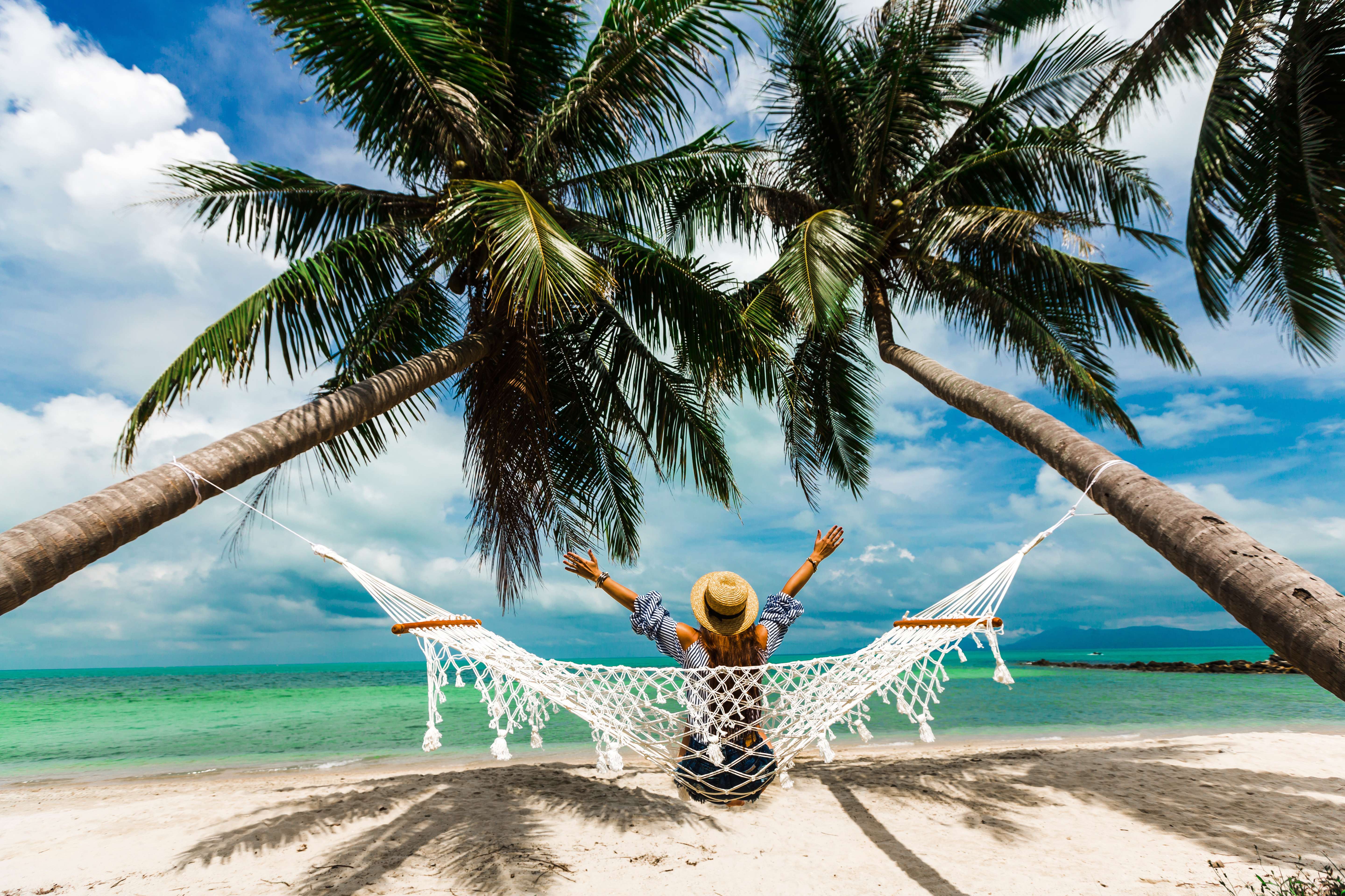 Tourist relaxing in the beach of Mauritius