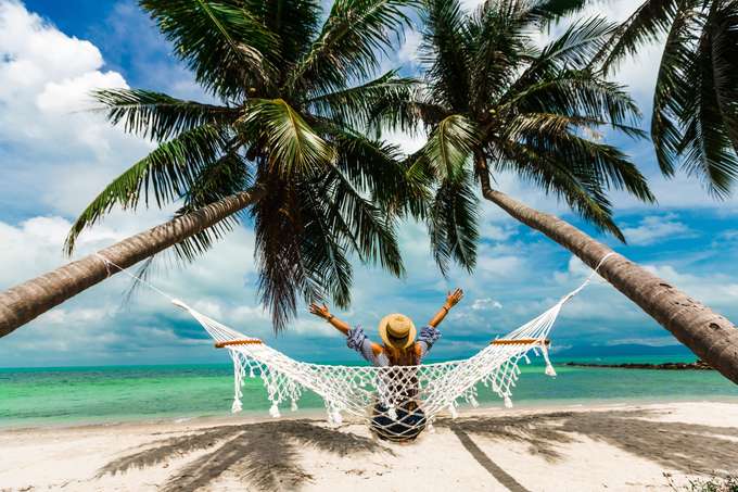 Tourist relaxing in the beach of Mauritius