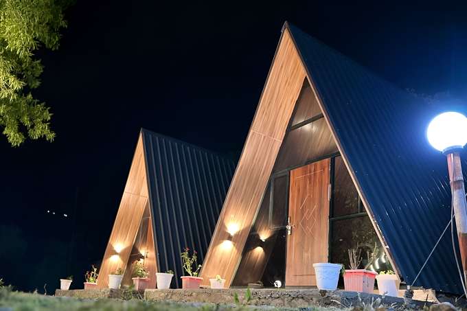 Reconnect with nature while enjoying the warmth of wooden interiors with stay in A-frame cottages