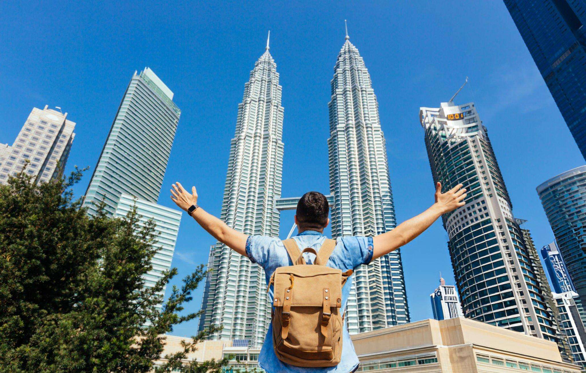 Tourist at Petronas Twin Tower in Kuala Lumpur