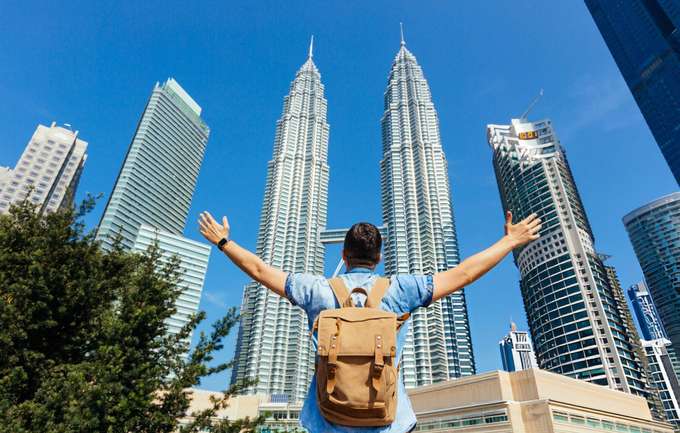 Tourist at Petronas Twin Tower in Kuala Lumpur